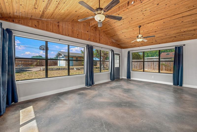 Sunroom windows looking out to the backyard