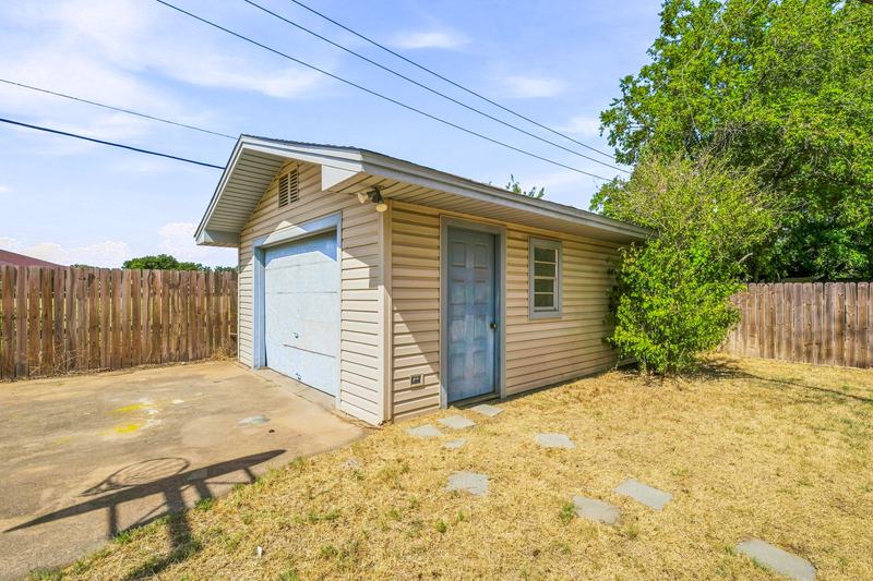 Detached shop with a garage door